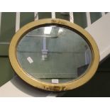 AN OVAL BEVEL PLATE WALL MIRROR in Oriental design lacquer frame