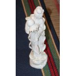 A 20TH CENTURY CHINESE PORCELAIN BLANC DE CHINE FIGURE GUANYIN, standing on a cloud base, 37.5cm