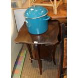 AN EARLY 20TH CENTURY MAHOGANY FINISHED FANCY SHAPED TWO-TIER OCCASIONAL TABLE