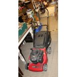 A MOUNTFIELD PETROL DRIVEN LAWNMOWER with a Briggs & Stratton 450 series E powered engine,