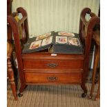 A FIRST QUARTER 20TH CENTURY MAHOGANY CONVERTED CANTERBURY, now formed as a music stool, with two