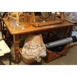 A PINE RECTANGULAR TOPPED KITCHEN TABLE