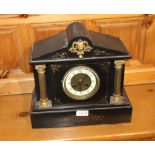A LATE VICTORIAN BLACK SLATE MANTEL CLOCK of architectural proportions, having cast gilt metal