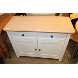 A LAURA ASHLEY BRANDED SIDE CABINET, with pale wooden top over two inline drawers, and two