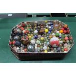 A TIN OF MARBLES VARIOUS