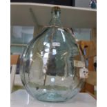 A LARGE CARBOY STYLE GLASS BASED LAMP