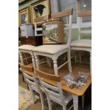 A BELIEVED LAURA ASHLEY BRANDED DINING SUITE, having extending light oak topped table on painted leg