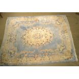 A LARGE PALE BLUE CHINESE WASH WOOL FLOOR CARPET, of floral design