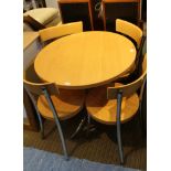 A MODERNIST KITCHENETTE SUITE comprising beech effect circular topped table on chromed legs,