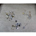 THREE BAGS CONTAINING A SELECTION OF COSTUME JEWELLERY VARIOUS to include; hat pins, rings, buttons,