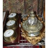 A 19TH CENTURY BRASS & GLASS DESK TOP INKWELL together with a three-piece port hole design weather