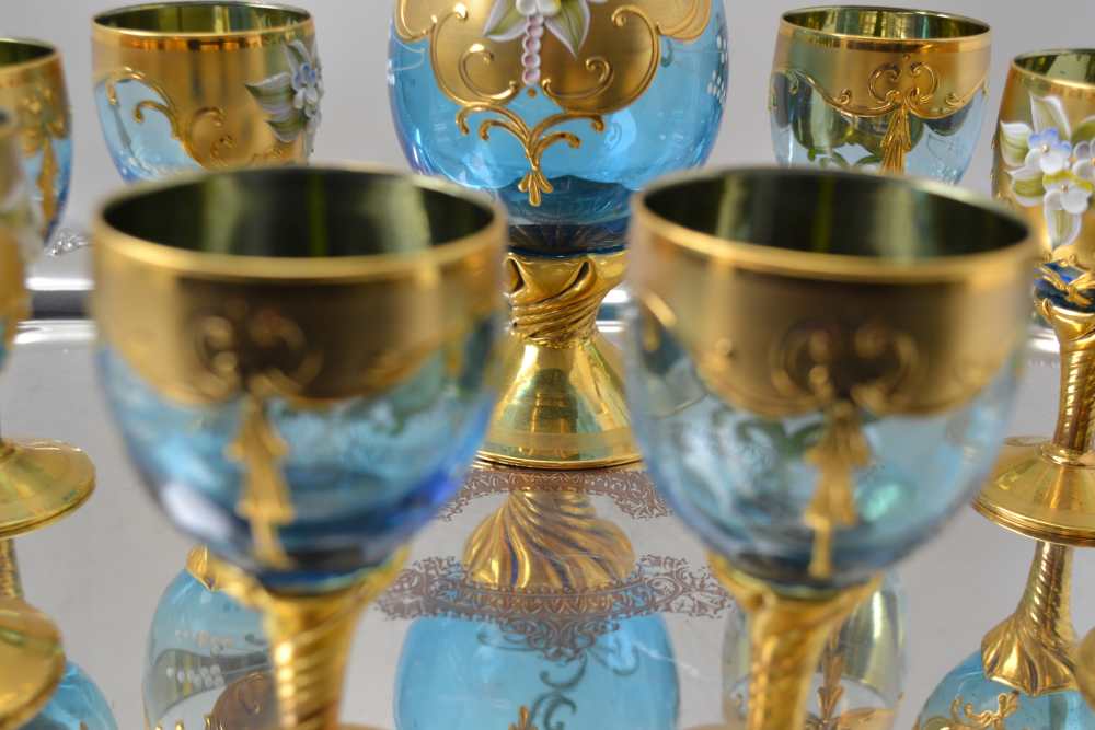 A 20TH CENTURY BOHEMIAN GLASS WINE DECANTER AND A SET OF EIGHT STEMMED GLASSES, blue tinted, heavily - Image 4 of 6