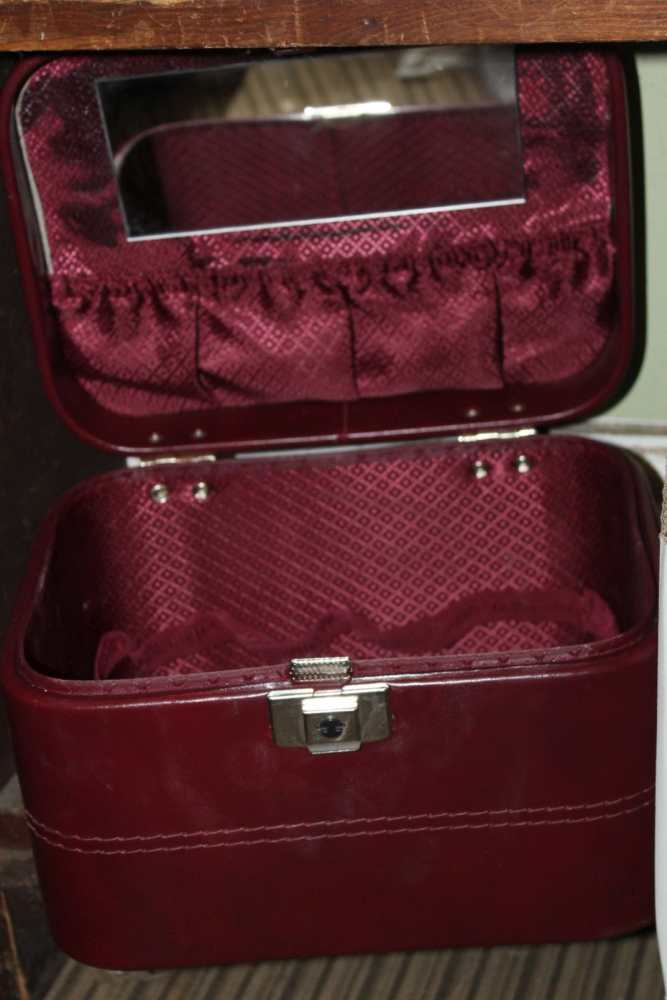 A LADY'S JEWELLERY CASE together with a selection of clutch and handbags various