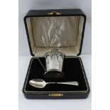 A CASED SILVER CHRISTENING SET of Deco design, Birmingham 1934, with spoon, Sheffield 1936, combined