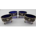 JOSEPH COOPER, A SET OF FOUR 18TH CENTURY PIERCED SILVER SALTS, oval form, pierced galleries, on