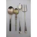 C. SHAPLAND & CO., A SILVER SPOON OF PLAIN, EARLY FORM, London 1935, together with a silver bread