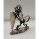 A 'WALKER & HALL' SILVER PLATED LION WITH SHIELD 12cm high