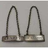 A GEORGE III SILVER 'CHERRY BRANDY' LABEL, makers mark, JT struck twice, Similar label for 'Claret',