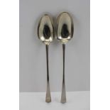 TWO 18TH CENTURY SILVER BASTING SPOONS, London 1774, John Lambe, the other with compressed marks,