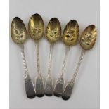 FIVE VARIOUS 19TH CENTURY SILVER FIDDLE PATTERN SPOONS, gilt bowls embossed with fruits, combined