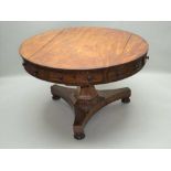 A 19TH CENTURY MAHOGANY FINISHED CIRCULAR RENT TYPE TABLE having plain top, with a continual band of