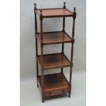 A LATE 19TH CENTURY ROSEWOOD FINISHED FOUR SHELVED WHATNOT with lightly turned and blocked supports,