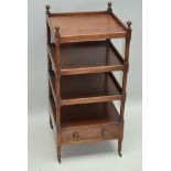 A 19TH CENTURY MAHOGANY FOUR-TIERED LOW WHATNOT the base section fitted full width single drawer,