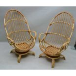 A PAIR OF LATE 20TH CENTURY ANGRAVES BRANDED INVINCIBLE BAMBOO ARMCHAIRS, on swivelled four legged