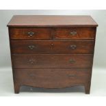A 19TH CENTURY OAK CHEST OF DRAWERS having plain rectangular top, over two inline and three