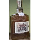 A COLLECTORS MOULDED GLASS JIM BEAM KENTUCKY STRAIGHT BOURBON BOTTLE depicting first issue pintail