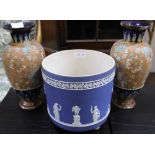 A WEDGWOOD BLUE JASPERWARE 3 LEGGED PLANTER with typical classical frieze together with a pair of
