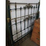 AN EARLY 20TH CENTURY PART PAINTED METAL DOUBLE BEDFRAME with brass caps & crest, complete with side