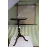 A WELL MADE REPRODUCTION MAHOGANY FINISHED SAUCER TOPPED WINE TABLE, sold together with a late