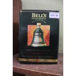 A BOXED BELLS WHISKEY DECANTER CHRISTMAS 1995 plus contents