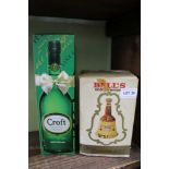 A BOXED BOTTLE OF CROFT SHERRY together with Bells Scotch Whiskey decanter in old bottling