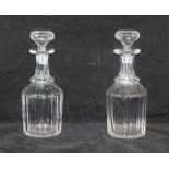 A PAIR OF EARLY VICTORIAN MALLET SHAPED DECANTERS, with deep vertical cut plates and matching