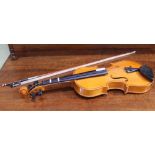 A CHILD SIZE VIOLIN and bow