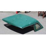 A VINTAGE GREEN FINISHED MG HARD TOP COVER