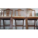 A SET OF TWELVE REPRODUCTION HEPPLEWHITE STYLE DINING CHAIRS with pierced single central slat,