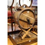 A VINTAGE COOPERED BARREL CHURN on associated stand