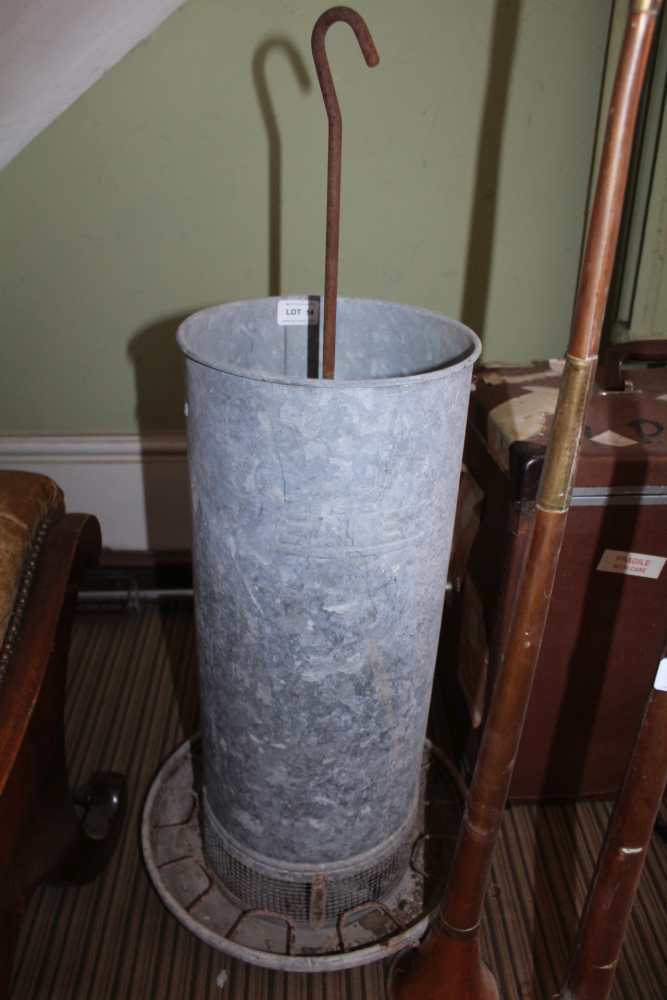 A GALVANIZED DOMESTIC FOWL FEEDER