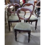 THREE VICTORIAN MAHOGANY BALLOON BACK CHAIRS with upholstered seat pads
