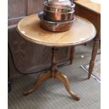 A PART 19TH CENTURY, LATER ADAPTED, CIRCULAR TOPPED OAK TABLE with yew wood crossbanding,