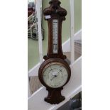 A 19TH CENTURY OAK BACKED BAROMETER THERMOMETER