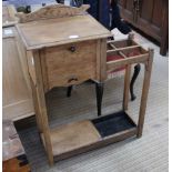 A LATE 19TH / EARLY 20TH CENTURY OAK FINISHED HALL STAND with stick aperture and drip tray, flanking