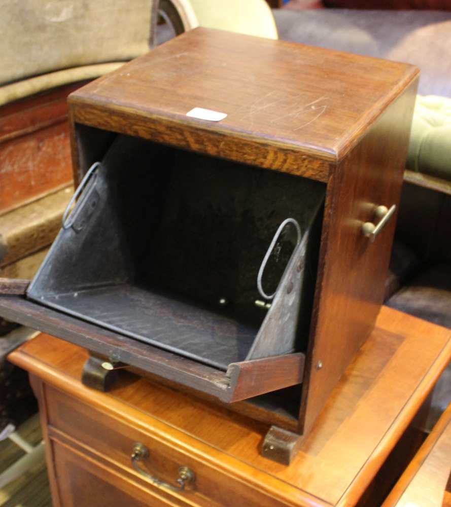 AN ART DECO DESIGN OAK FINISHED COAL BOX