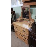 A LATE 19TH CENTURY PINE DRESSING CHEST with adjustable mirrored back, with twin jewellery drawers