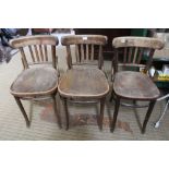 THREE LOW BACKED BENTWOOD SOLID SEATED CHAIRS