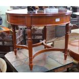 A PAIR OF REPRODUCTION YEW WOOD FINISHED CIRCULAR TOPPED LAMP / COFFEE TABLES on carved leaf and