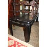 A BLACK FINISHED ORIENTAL DESIGN LONG & LOW COFFEE TABLE (or perhaps a stool)